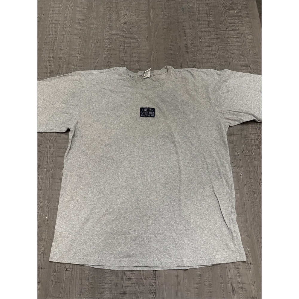 Vintage Y2K 90s Calvin Klein Jeans Supply T Shirt Size XL NY -CK Reg 5-23-99
